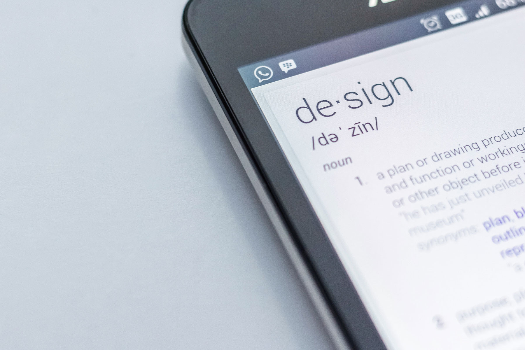 custom website design bolingbrook phone screen showing definition of design